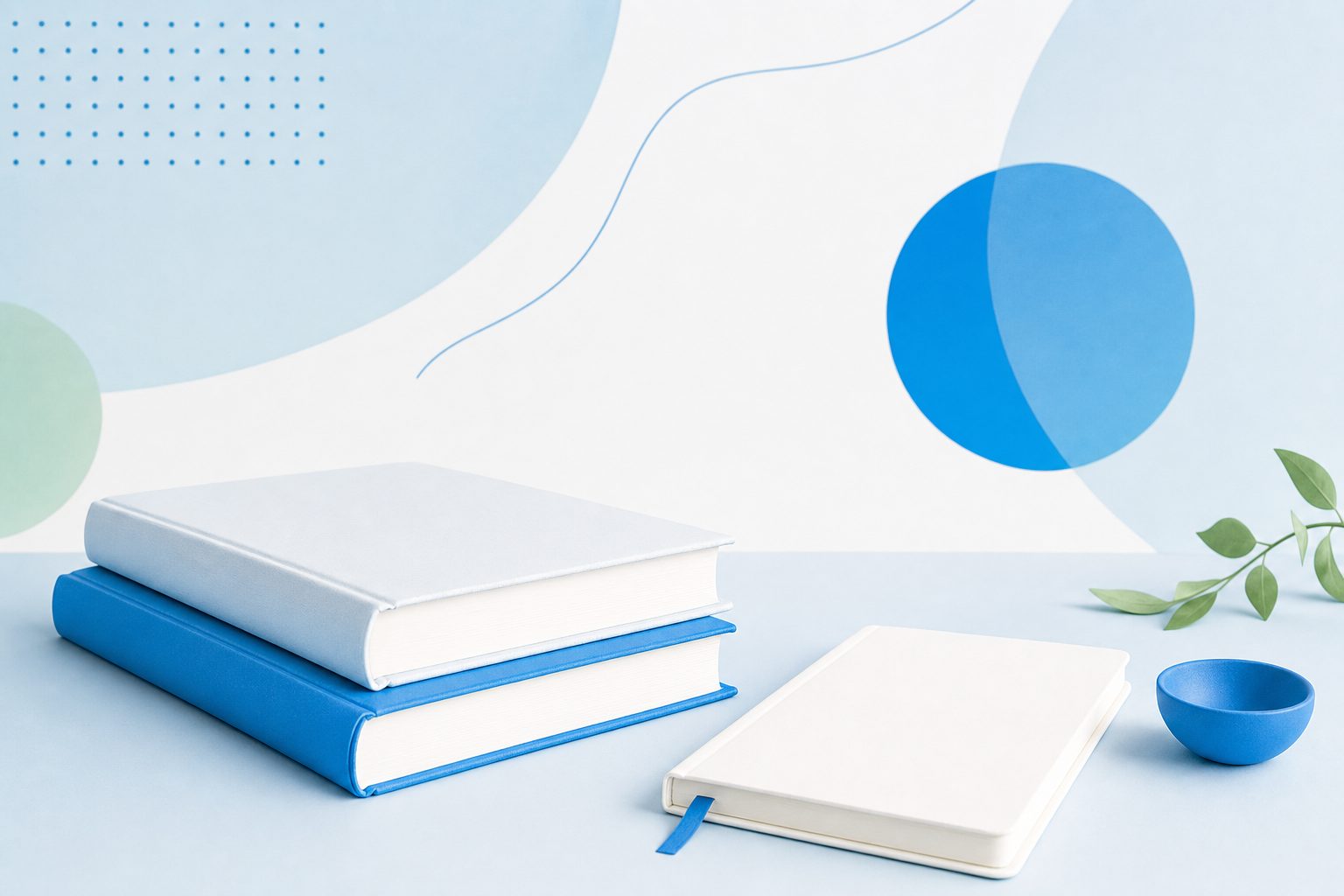 Two closed reference books stacked on a pale blue desk beside a plain notebook